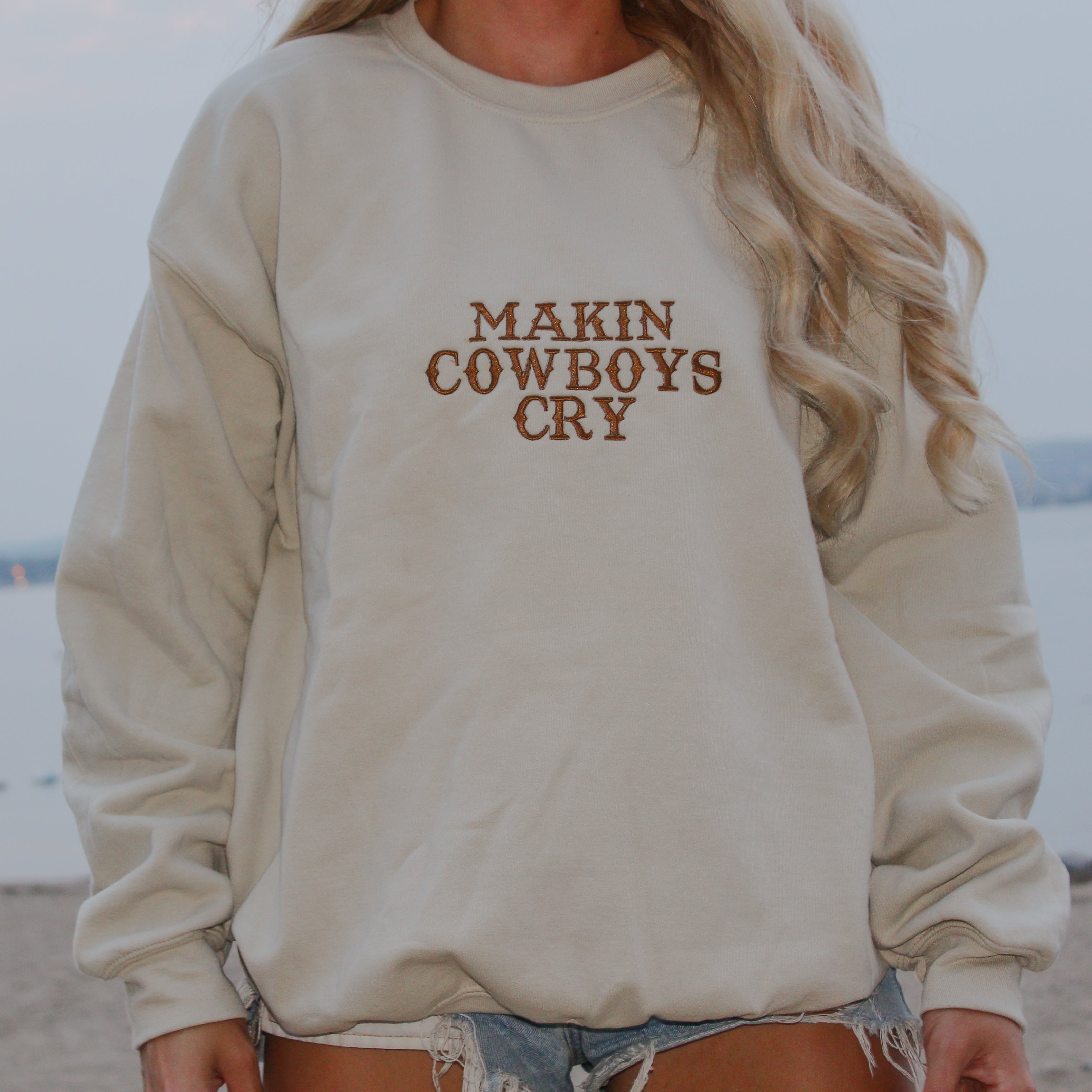Makin Cowboys Cry Embroidered Crewneck